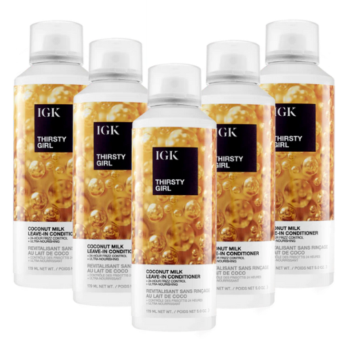 Five bottles of IGK Thirsty Girl Coconut Milk Leave-In Conditioner.