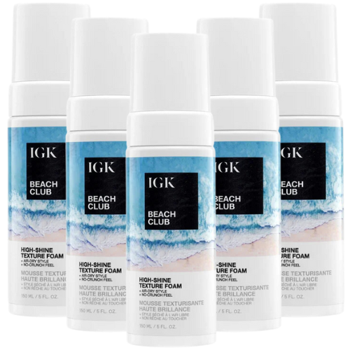 Five bottles of IGK Beach Club high-shine texture foam arranged together.