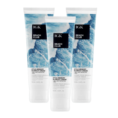 Three tubes of IGK Beach Club blowout cream with ocean-themed packaging.
