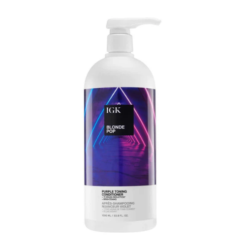Bottle of IGK Blonde Pop purple toning conditioner with geometric design.