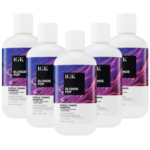 Five bottles of IGK Blonde Pop Purple Toning Shampoo.