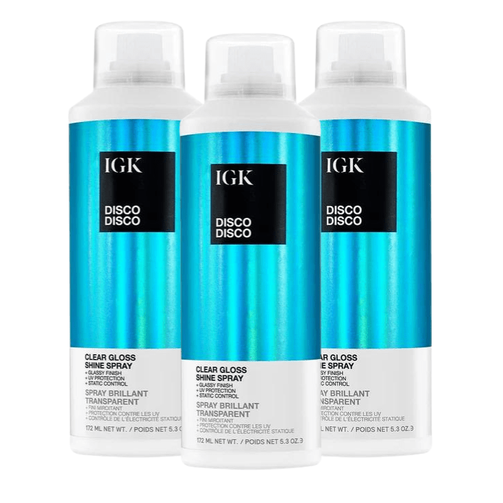 Three bottles of IGK Disco Disco Clear Gloss Shine Spray.
