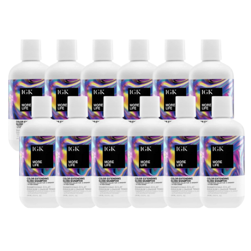 Ten bottles of IGK More Life hair product with colorful labels.
